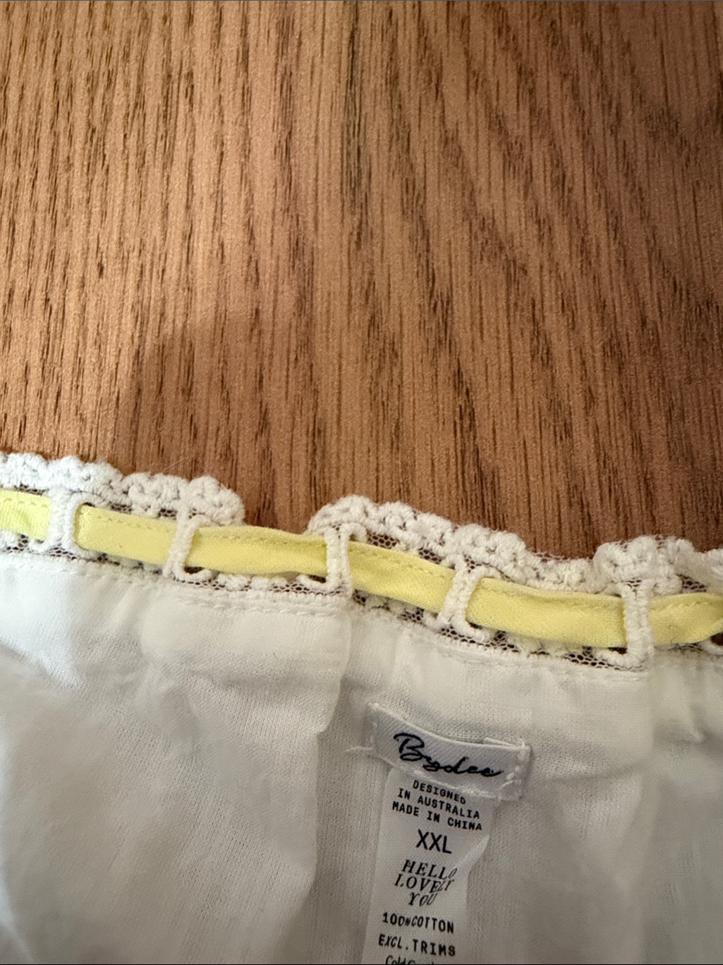 White Crop Top With Yellow Trim And Lace Accents — image 4 of 4